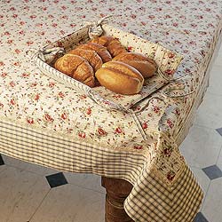 The delightful antique rose pattern on our table linen is reminiscent of designs on traditional