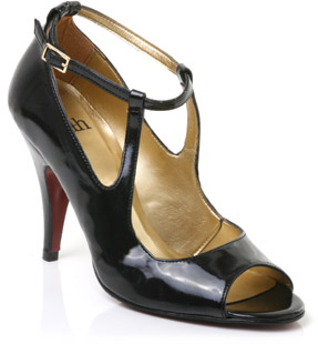 Patent court shoe with double T-bar strap and buckle. The Creal shoe has a peep-toe and high covered