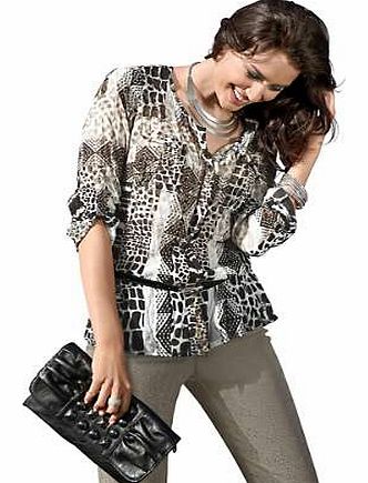 On trend crushed look blouse in comfortable slip-on design. With breast pockets and button tab long sleeves with narrow cuffs. All over high quality mix print. Creation L Blouse Features: Casual fit Washable 100% Polyester Length approx. 68 cm (27 i