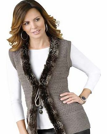 Set the trend with this waistcoat thanks to the snug faux fur trim. Features stunning textured pattern and tie belt at the front. Creation L Waistcoat Features: Ribbed cuffs and hem Flattering fit Washable 100% Polyacrylic Length approx. 70 cm (27 i