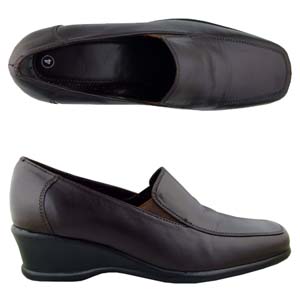 A classic loafer from Jones Bootmaker. Features wedge heel, squared off toe and elastic gussets to t