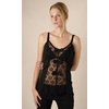 The Demi camisole is a strappy black top with a sultry lace panel down the middle, with 3 little bow