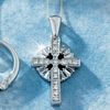 9ct white gold cross set with 0.50ct round and baguette diamonds. Chain length 46 cm (18 ins).