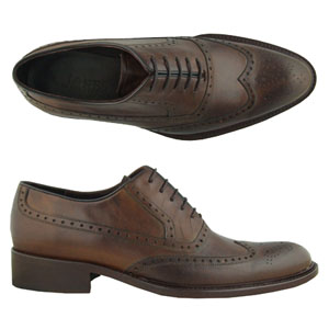 A modern 5 eyelet wing-tip brogue from Jones Bootmaker. Features a stylish Almond shaped toe and lea