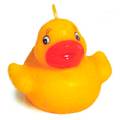 A set of three duck candles. Bright yellow with cu