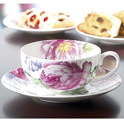 This delightful fine bone china cup and saucer is decorated with a romantic peony design
