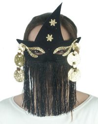 This witch eye mask features a silky fringe and large golden earrings to add an extra twist of