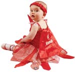 Official licensed costume includes dress with embroidered crest, detachable wings, embroidered cape 