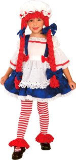 Costume includes hat with attached yarn hair, and dress with apron.