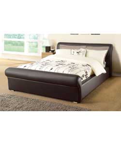 Luxuriously upholstered brown faux leather bed in a contemporary sleigh bed design. Size (W)161, (L)