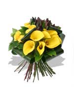Twilight mischief A mesmerising leopards rosette of golden roses calla lilies and opal petals that