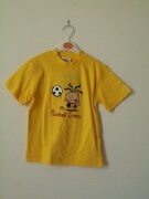 Bubblegum yellow short sleeved t-shirt wth football crazy design on the fro