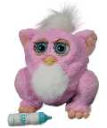 Hey, this is a Furby Baby! Its very little but it likes to have lots of fun! \"Feed\" it its bottle