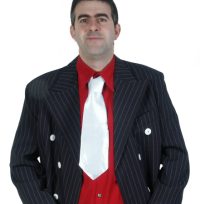 A wide white kipper tie for dressing up as a gangster