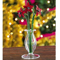 Miniature glass replicas of a traditional Christmas flower crafted in delicate glass