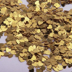 Gold Heart Confetti looks great scattered over tables at parties or at weddings. You can even use