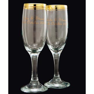 This pair of gold rimmed champagne flutes make an ideal wedding or anniversary gift. Personalise