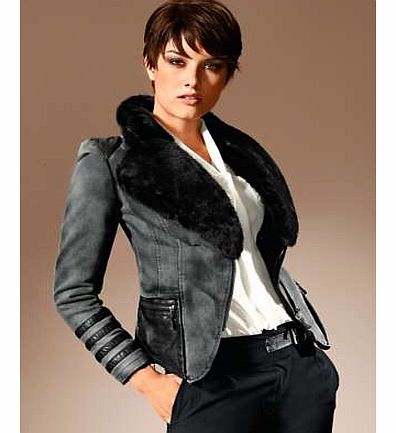Gorgeous, faux leather trim detailed denim jacket with long sleeves and decorative stitching. Featuring decorative zips on the back and a removable faux fur collar. Heine Jacket Features: Lined design Washable 97% Cotton, 3% Elastane Trim: 60% Polyur