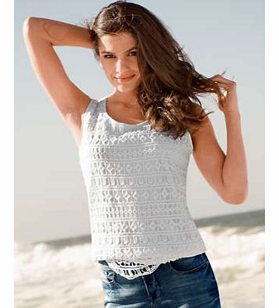 This top is the perfect example of how to work the crochet trend into your look. Sleeveless top with pretty crochet detail on the front and plain white on the back. This is a great addition to your summer wardrobe. Heine Top Features: Washable 100% C