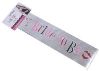 A shiny `Miss World` style sash which you can force the Bride-to-be to wear. She will really stand o