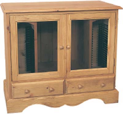 A beautiful pine hi fi cabinet with 2 glazed doors and 2 drawers. There is also an internal CD