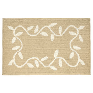 Washable polypropylene runner with latex backing. Featuring a design of cream leaves on a beige back