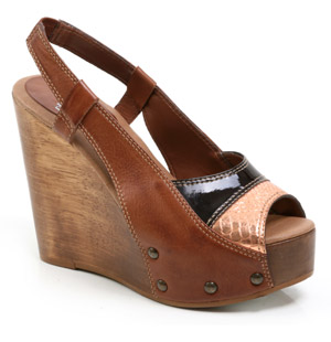 Leather sandals featuring metallic mock snake skin and patent detail. The Hife wedges have an almond