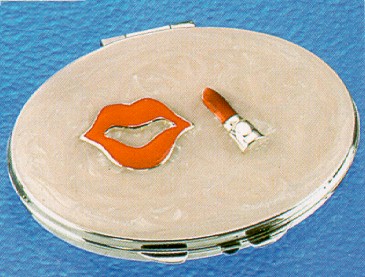 A fun hippy chick compact mirror. Red lips and lipstick case on a pearlised background. Great item