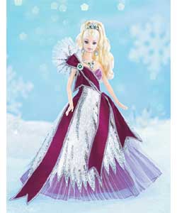The 2005 Holiday; Barbie; doll wears a gown embellished with glittering sparkles with tulle,