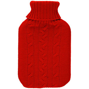 Hot water bottle "wearing" a bright red cable knit cover