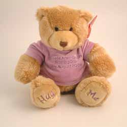This beautiful hand made Hug Me soft teddy comes in 4 colours and is 25cms high from sitting  with