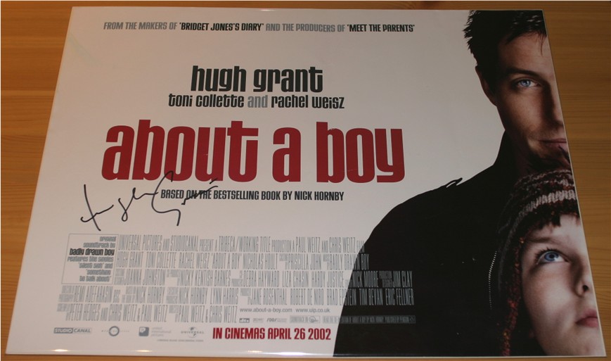 HUGH GRANT SIGNED ABOUT A BOY POSTER - 16 x 12