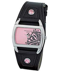 Pink sunray dial with printed brown floral detail. Brown strap.