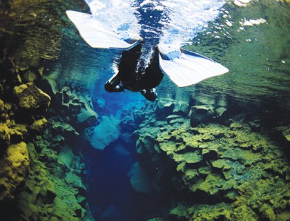 In The Blue Snorkelling - Reykjavik - Intro Want to do something completely different whilst in Iceland? Then head to one of the countrys best kept secrets and snorkel in the crystal clear waters of a deep otherworldly fissure in Silfra! In The Blue 