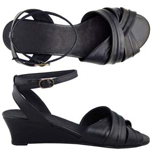 A comfortable sandal from Jones Bootmaker. Features interwoven straps, low wedge heel and soft leath