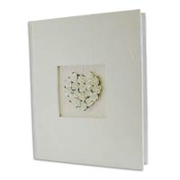 Beautifully bound in handmade paper with a heart m