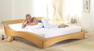 The Jaybe Ski Wooden Bedstead Contemporary curved