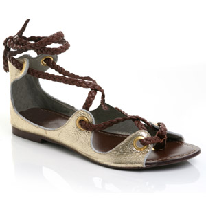 Metallic leather flip flop with cut out panels and metallic eye-holes. The Jelis2 sandals have a pla