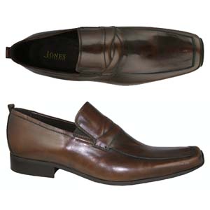 A modern loafer from Jones Bootmaker. Features a penny loafer style band across the top, square toe 