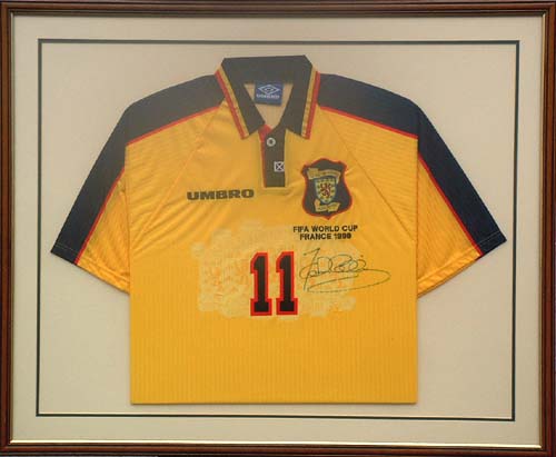 This unique item of memorabilia is an actual shirt worn by John Collins for Scotland during the 1998