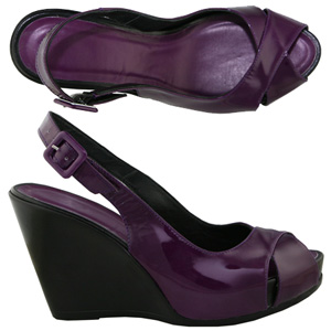 A fashionable Wedge heel Patent shoe from Jones Bootmaker. With peep toe, cross over strap detail to