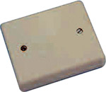 A junction box for   interconnecting cables of a security system. The box has a pair of contacts at 