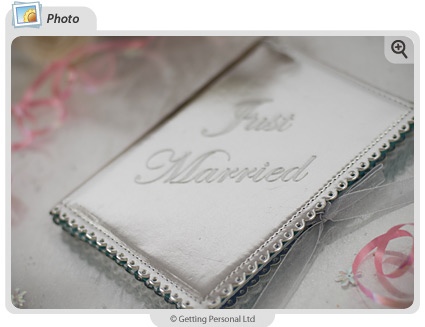 Just Married Photo AlbumOur Just Married Photo Album silver leather photo album is embossed with the