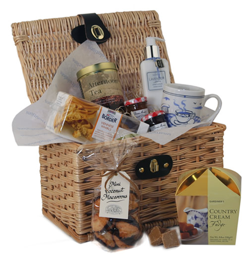 Luxury wicker hamper with leather straps filled with gorgeous gifts for the a special lady. The Just