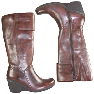 A stylish knee high boot from Hush Puppies. With wedge heel, a full zip and an elasticated gusset. C