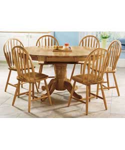 Antique pine solid wood extending table and 6 chairs.Size of table (D)106, (H)77cm.Length when