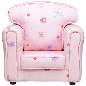 A bright and comfortable armchair in pink with flo