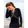 Jersey top with lace and sequin trim. Washable. 95 Viscose, 5 Elastane.