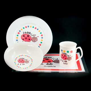 Make breakfast fun with this ladybird bone china mug  bowl and plate set which can be personalised