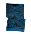 This large, square scarf is made from pure silk and features the prettiest floral print in kingfishe